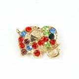 Brosa martisor elefant auriu cu pietre multicolore