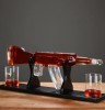 Set pentru Cognac, Whiskey&nbsp; Sticla-decantor AK47,&nbsp;4 pahare si suport din lemn