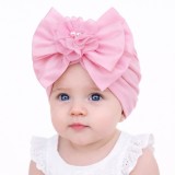 Caciulita roz tip turban cu funda din satin aplicata in fata (Marime