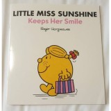 LITTLE MISS SUNSHINE KEEPS HER SMILE