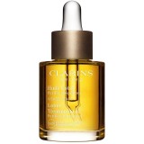Clarins Lotus Treatment Oil ulei de regenerare cu efect de netezire ziua și noaptea 30 ml