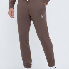New Balance pantaloni de trening culoarea maro, neted