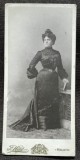Fotografie pe carton, femeie in rochie lunga si cu coc, 1904