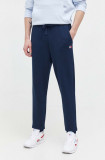 Cumpara ieftin Tommy Jeans pantaloni de trening din bumbac culoarea bleumarin, uni DM0DM18355