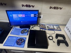 consola playstation 4 slim cu 2 manete si jocuri foto