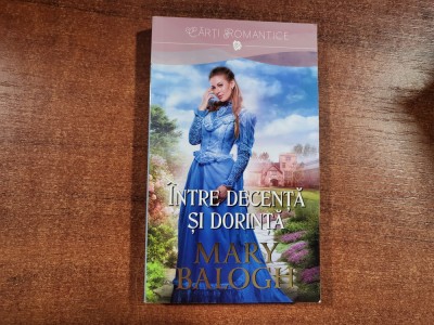 Intre decenta si dorinta de Mary Balogh foto