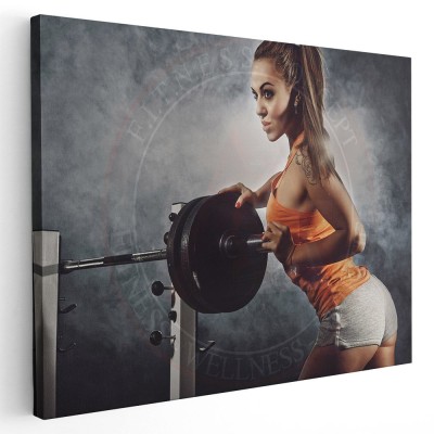 Tablou femeie langa aparat fitness cu haltere Tablou canvas pe panza CU RAMA 20x30 cm foto