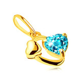 Cumpara ieftin Pandantiv din aur 375 - contur oval, inimă lucioasă, inimă din topaz albastru