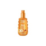 Garnier Ambre Solaire Ideal Bronze SPF 30 Lapte bronzant cu protecție solară 150 ml