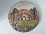 Placa ceramica de perete, Ruscha, peisaj rural cu casă și copaci, anii 1970, cu agatatoare, 28cm diametru, West Germany