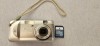 APARAT FOTO DIGITAL CANON PC 1185 + CARD 512 MB , FUNCTIONEAZA CU 2 BATERII AAA SAU ACUMULATORI .