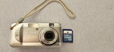 APARAT FOTO DIGITAL CANON PC 1185 + CARD 512 MB , FUNCTIONEAZA CU 2 BATERII AAA SAU ACUMULATORI .