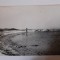 Fotografie cu un bărbat &icirc;n apă la mare