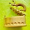 F989-Calcator mic vintage cu cap de melc bronz masiv aurit stare buna.