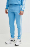 Cumpara ieftin Adidas Originals pantaloni de trening neted, IM9451