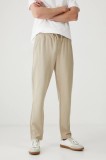 Medicine pantaloni de trening culoarea bej, neted