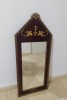 Eleganta oglinda Empire cu o deosebită rama din lemn intarsiată