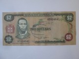 Jamaica 2 Dollars 1982 bancnota din imagini cu mici gaurele