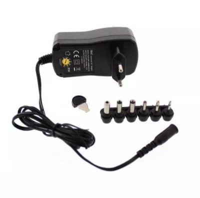 Alimentator universal in comutatie 1500mA 3-12V 6 mufe Well foto