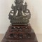 Mica statueta din bronz &quot;Budha pe suport de lemn&quot;