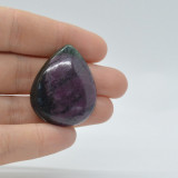 Cabochon rubin in zoisit 34x28x7mm a13