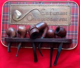 Lot lulele (pipe) in suport En fumant On est content