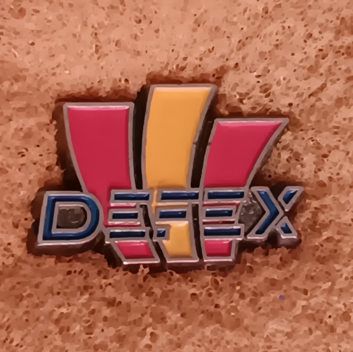 QW9 N6 85 - Insigna - tematica reclama - DEFEX