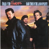 Vinil Omar And The Howlers &lrm;&ndash; Hard Times In The Land Of Plenty (VG+)