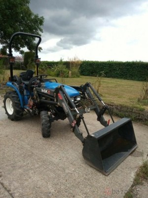 Tractor New Holland T-tC211D foto
