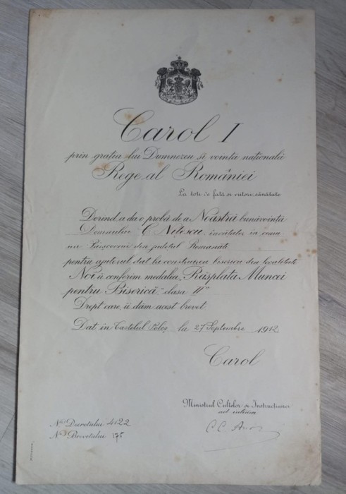 Brevet Rasplata Muncii pt Biserica , cls a 2-a , model Carol 1, emis in 1912 pe foaie dubla cu filigran . Piesa rara !