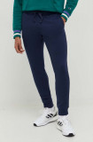 Champion pantaloni de trening culoarea albastru marin, neted