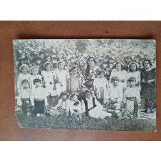 Fotografie tip carte postala, grup de copii cu dascalul lor, perioada interbelica