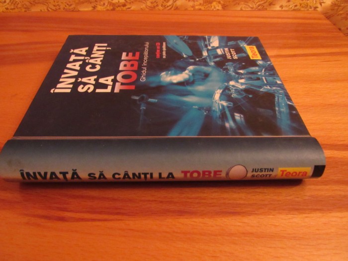 Invata sa canti la tobe - Justin Scott