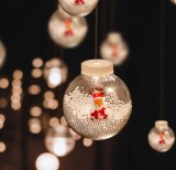 Perdea luminoasă LED - glob de zăpadă cu Moș Crăciun - 2,7 x 0,75 m - 110 LED-uri alb cald - IP44