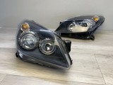 Faruri sport Opel Astra H GTC Twintop Angel Eyes look negru cu lupa NOU