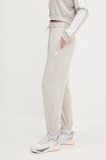 adidas pantaloni de trening Essentials culoarea bej, neted, JC8305