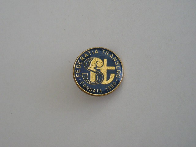 QW9 J 35 - Insigna - tematica sindicate - Federatia Transloc - 1990