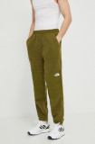 Cumpara ieftin The North Face pantaloni de trening culoarea verde, neted