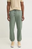 HUGO pantaloni de trening din bumbac culoarea verde, cu imprimeu, 50530435