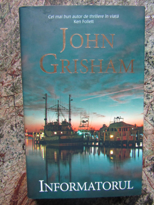 INFORMATORUL-JOHN GRISHAM CARTONATA