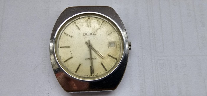 CEAS DOXA AUTOMATIC ,DEFECT , NU FUNCTIONEAZA NU CUNOSC CAUZA .