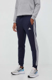 Adidas pantaloni de trening culoarea bleumarin, cu imprimeu IJ6493