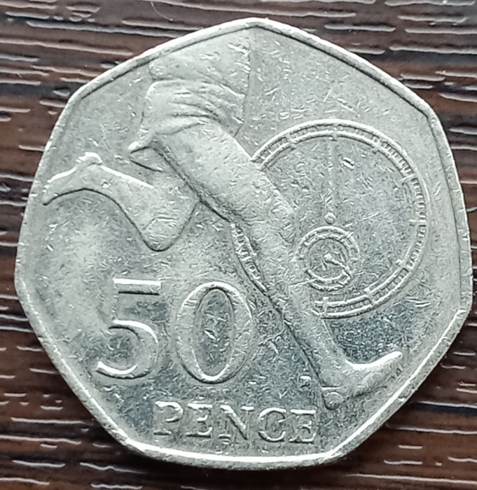 (S) MONEDA ANGLIA - 50 PENCE 2004, ANIVERSARE A 50 DE ANI DE LA PRIMA MILA IN 4 MINUTE DE ROGER BANNISTER