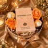 Set cadou Trespassing Lady parfum 100ml, 2 trandafiri sapun, Ferrero Rocher, cutie rotunda aurie eleganta