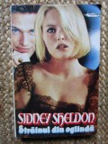 STRAINUL DIN OGLINDA-SIDNEY SHELDON