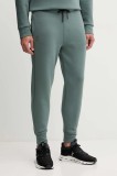 On pantaloni de trening Focus Tech culoarea verde, uni, 1MF30320153