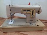 Mașină de cusut electrică
