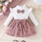 Set pentru fetite &ndash; Bluzita alba cu papion si fustita roz pudra (Marime