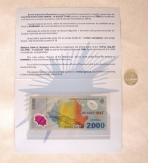 ECLIPSA BANCNOTA DE 2000 LEI IN FOLDER SI MONEDA DE 500 LEI 1999 UNC