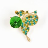 Brosa martisor fluture auriu cu pietre verzi